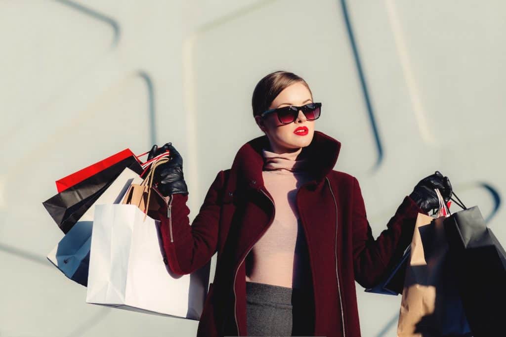 Shopper with dozens of new purchases (and choices)