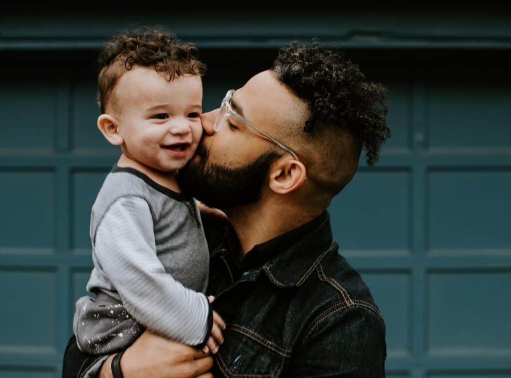 father devoted to young son