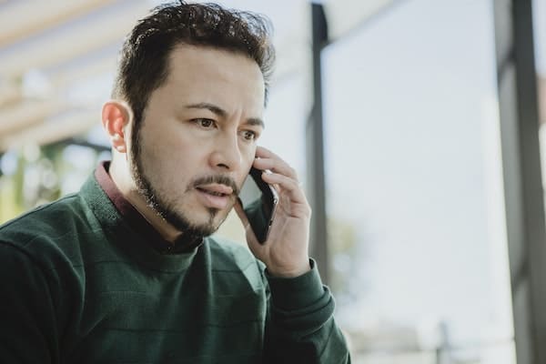 man hearing other's feelings on call