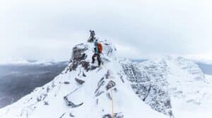 Mountain climbers summiting