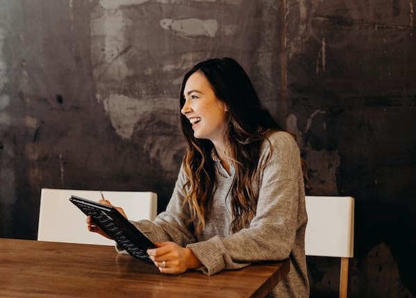 Woman feeling satisfied with her work and life