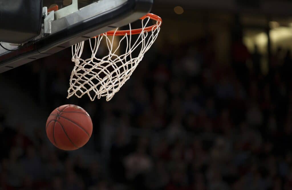 Basketball going through a hoop