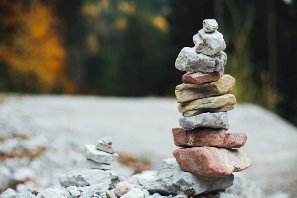 Rocks stacked to resemble balance.