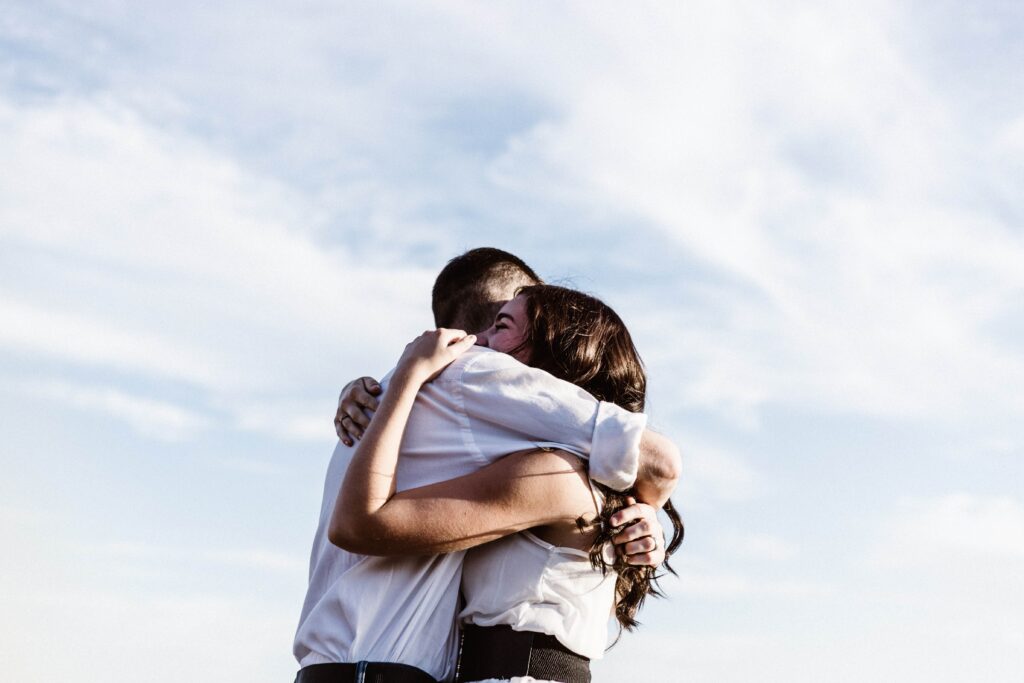 Two people hugging