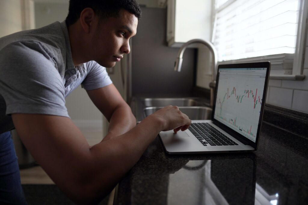 Man Looking At His Investment's Performance