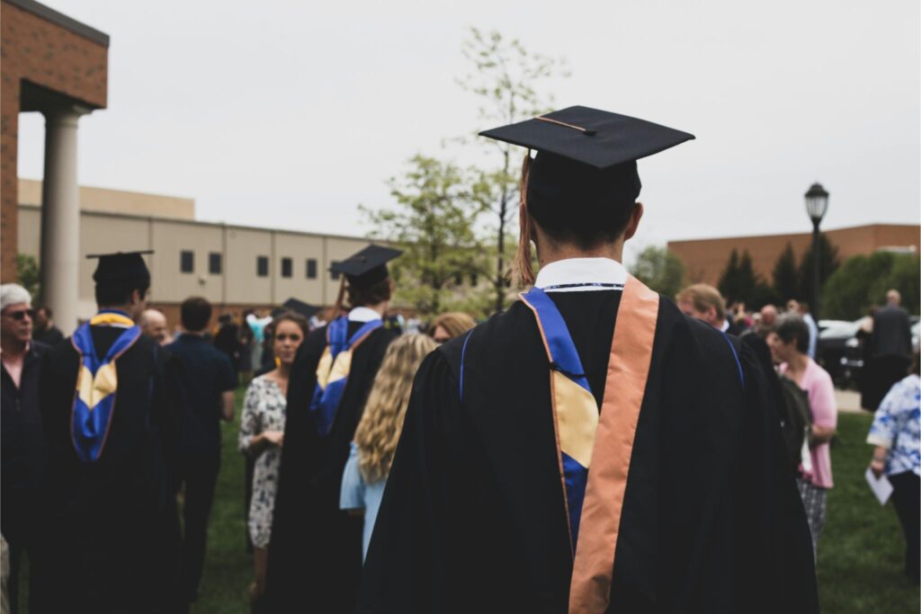 Students in cap and gowns for graduation