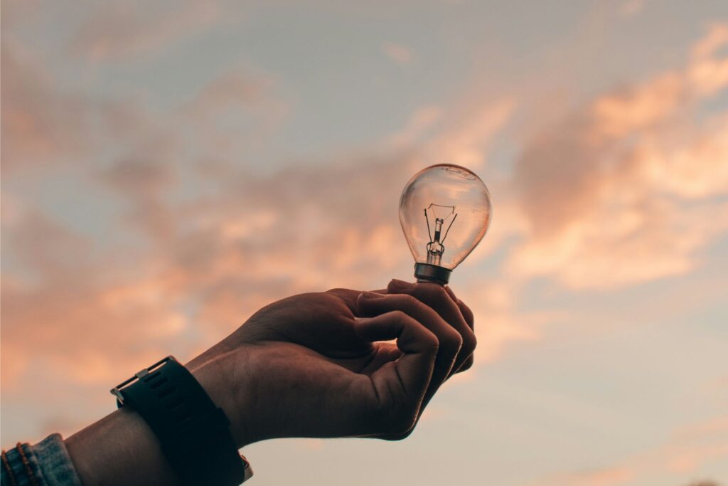 Lightbulb in front of the sunset